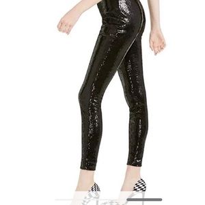 Fun and fabulous black sequined pants. They are stretchy and form fitting. NWT